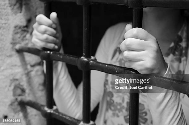 woman in jail - syria attack stock pictures, royalty-free photos & images