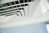 ventilation system; air condition vent in office ceiling close up