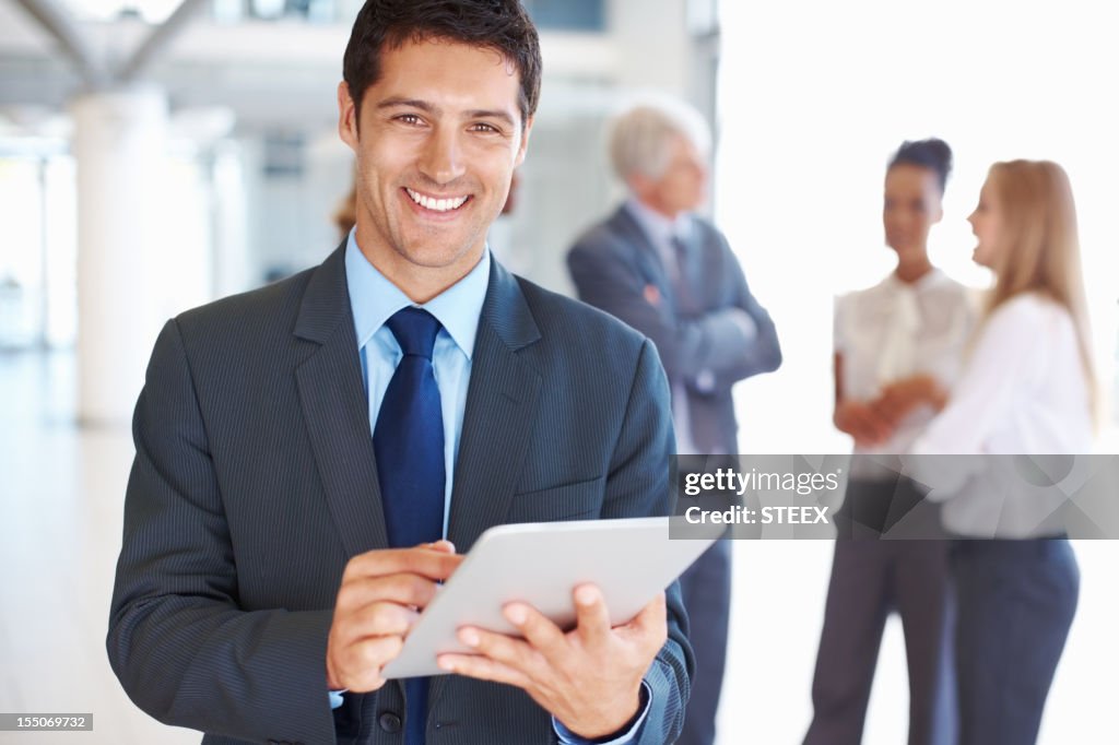 Business man working on digital tablet