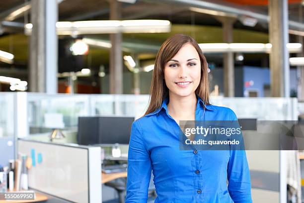 beautiful young businesswoman portrait in office cubicle, copy space - woman shirt stock pictures, royalty-free photos & images