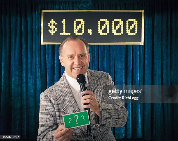 vintage game show host - holding microphone stock pictures, royalty-free photos & images
