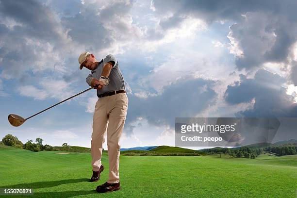 golfer playing on golf course - golf swing 個照片及圖片檔