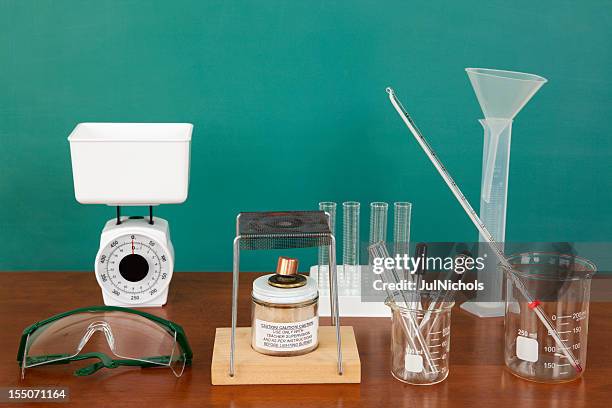 laboratory equipment in classroom - reageerbuisrek stockfoto's en -beelden