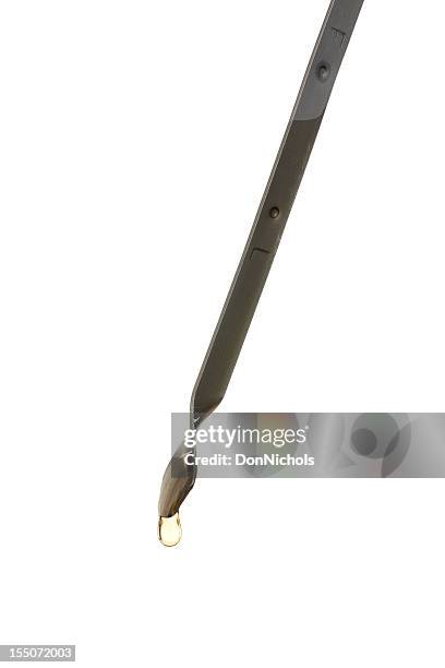 oil on the dipstick - dipstick stock pictures, royalty-free photos & images