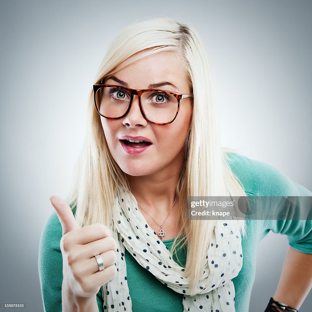 Woman doing thumbs up