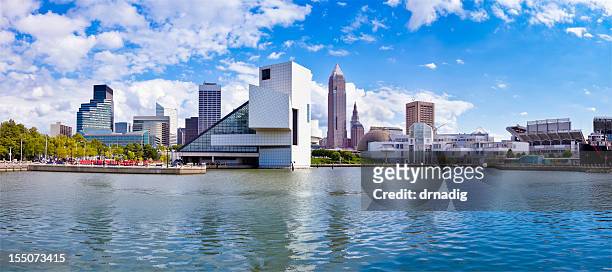 cleveland waterfront panorama with stadium, museums and cleveland skyline - cleveland ohio stock pictures, royalty-free photos & images