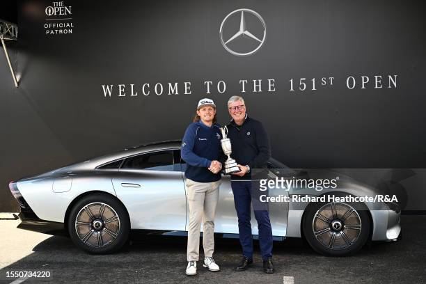 Winner, Cameron Smith of Australia arrives with the Claret Jug Trophy and poses with Martin Slumbers, Chief Executive of the R&A prior to The 151st...