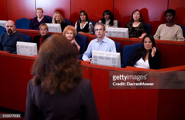 a lawyer speaking to a jury of people - jury stock pictures, royalty-free photos & images