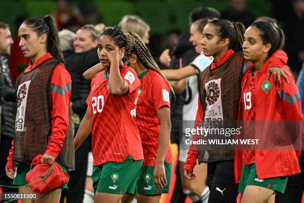 Morocco's midfielder Sofia Bouftini reacts with teammates after losing against Germany in their Australia and New Zealand 2023 Women's World Cup...