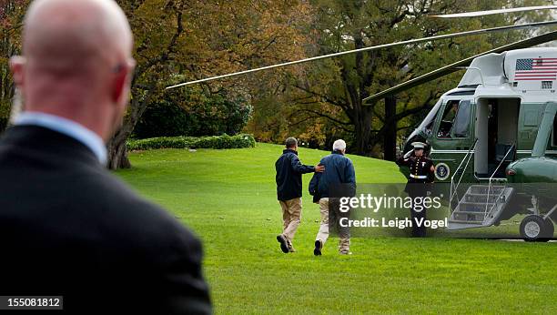 Administrator Craig Fugate and President Barack Obama walk toward Marine One where they will depart the White House to tour disaster-striken New...