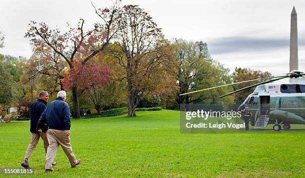 Administrator Craig Fugate and President Barack Obama walk toward Marine One where they will depart the White House to tour disaster-striken New...