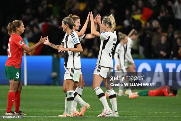 Germany's players celebrate after the Australia and New Zealand 2023 Women's World Cup Group H football match between Germany and Morocco at...