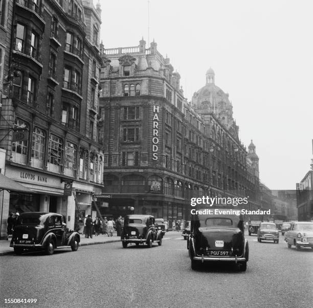 Brompton Road in Knightsbridge, London, with Harrods department store on the left, June 26th 1959.