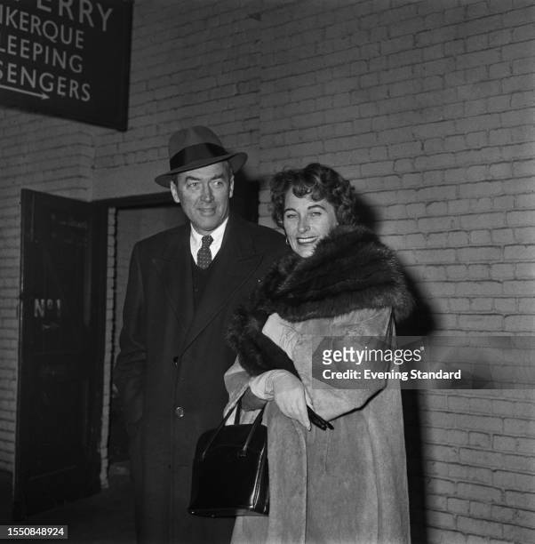 American actor James Stewart and wife Gloria Hatrick McLean pictured during a visit to England, February 26th 1959.