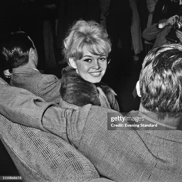 French actress Brigitte Bardot arriving in London to film 'Babette Goes to War', April 9th 1959.