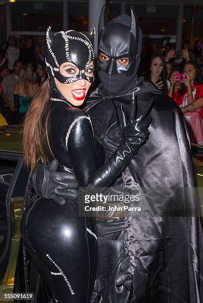Kim Kardashian and Kanye West arrive at Kim Kardashian's Halloween party at LIV nightclub at Fontainebleau Miami on October 31, 2012 in Miami Beach,...