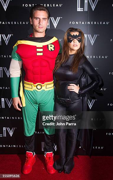 Scott Disick and Kourtney Kardashian arrive at Kim Kardashian's Halloween party at LIV nightclub at Fontainebleau Miami on October 31, 2012 in Miami...