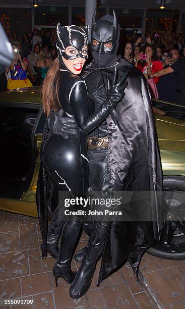 Kim Kardashian and Kanye West arrive at Kim Kardashian's Halloween party at LIV nightclub at Fontainebleau Miami on October 31, 2012 in Miami Beach,...