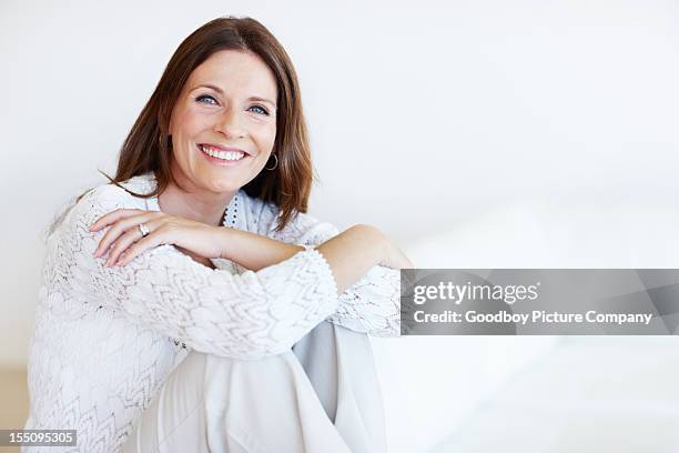 happy middle-aged woman relaxing - pretty older women 個照片及圖片檔
