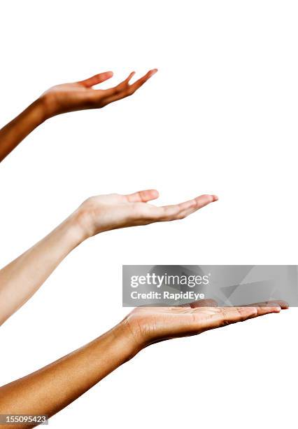 three female hands held out palms up against white - hand receiving stock pictures, royalty-free photos & images