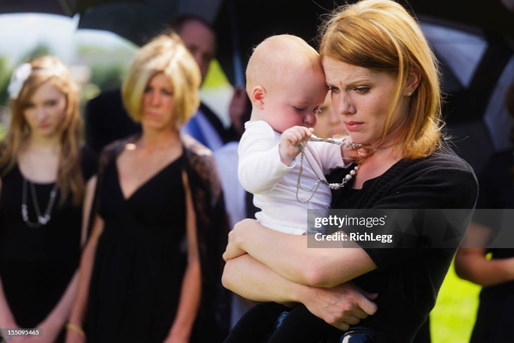 Mother and Baby at a Funeral