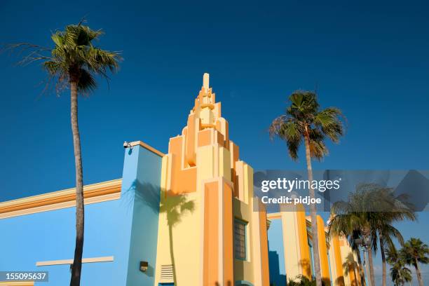 colorful painted art deco houses in miami florida usa - miami stockfoto's en -beelden