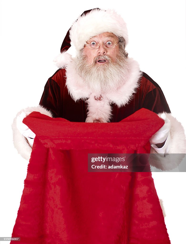 Santa Claus Looking in Sack of Presents