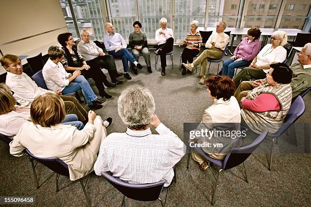 group therapy - staff meeting stock pictures, royalty-free photos & images