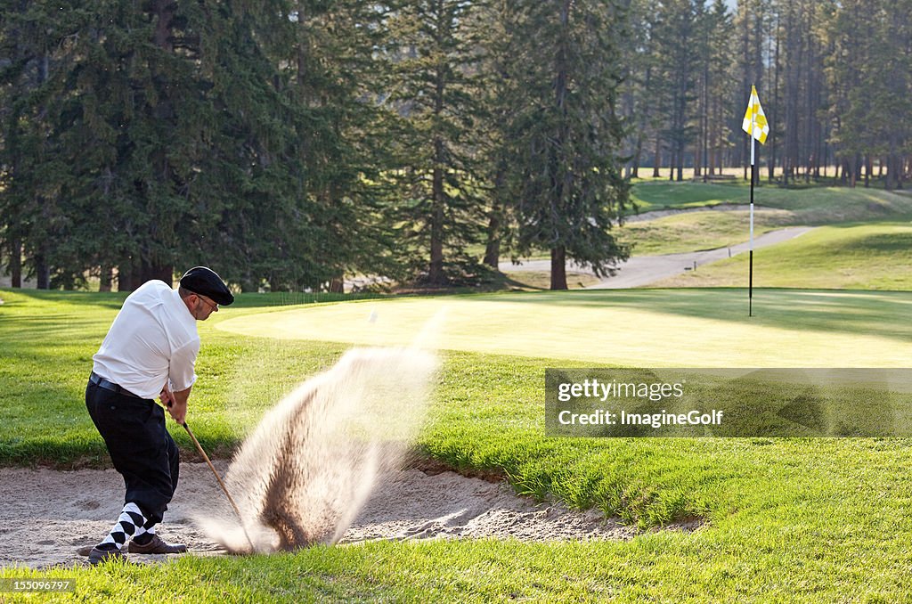 Classy Male Caucasian Golfer Hitting Bunker Shot