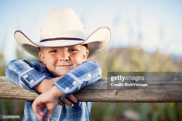 little cowboy - cowboys stock pictures, royalty-free photos & images
