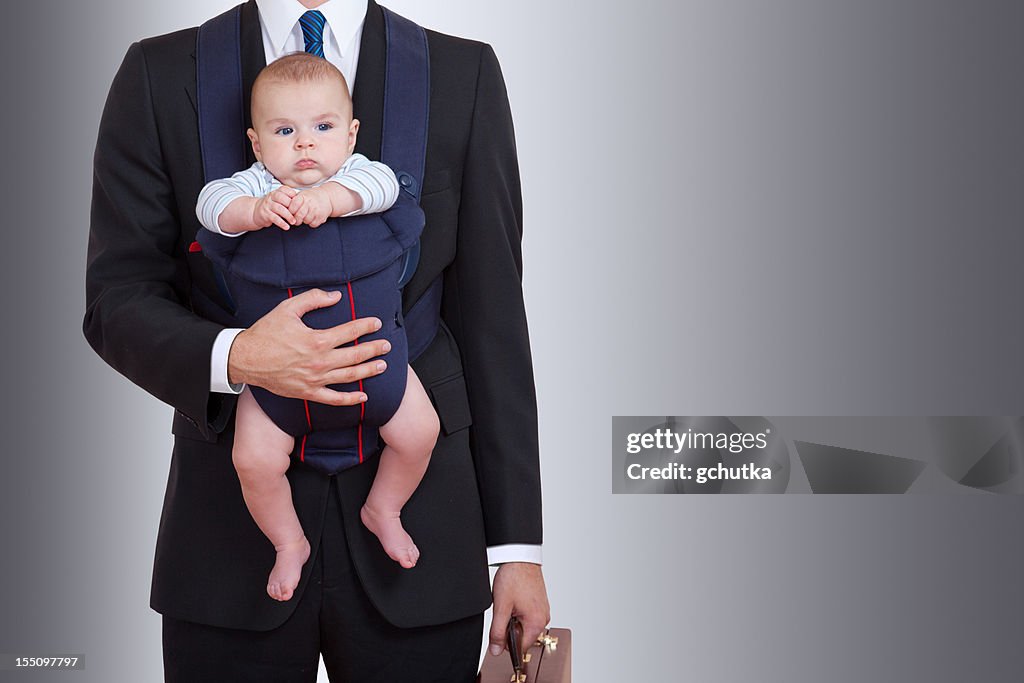 Geschäftsmann mit Baby