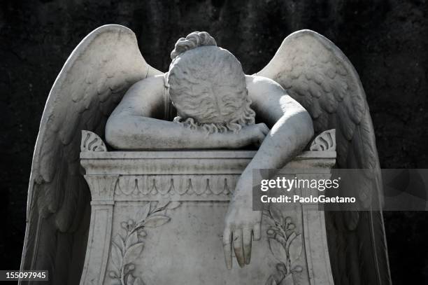 the angel of pain - statue stock pictures, royalty-free photos & images