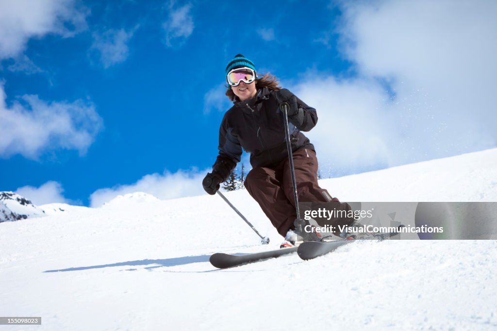 Young woman skiing.