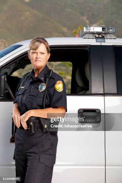 police woman on patrol - police woman stock pictures, royalty-free photos & images