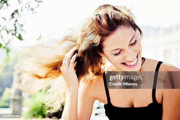 happiness, natural laughing woman in summer park portrait - candid beautiful young woman face stock pictures, royalty-free photos & images