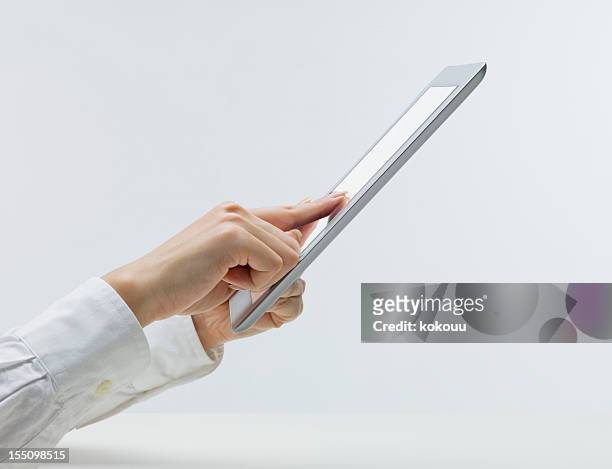 woman's hands using digital tablet pc - touchpad bildbanksfoton och bilder