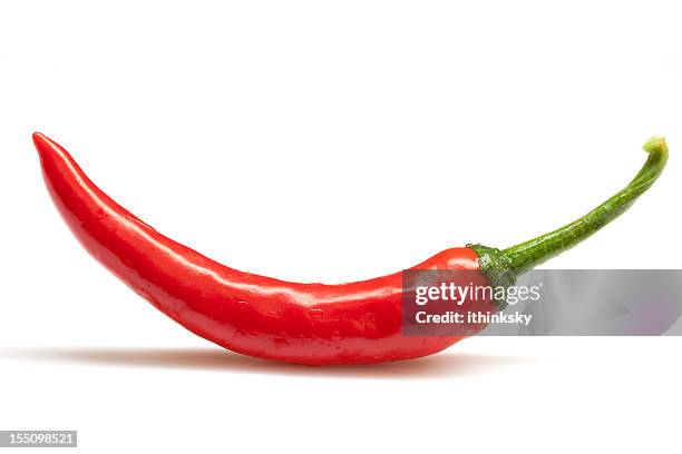 rote chili peppers - green chili pepper stock-fotos und bilder