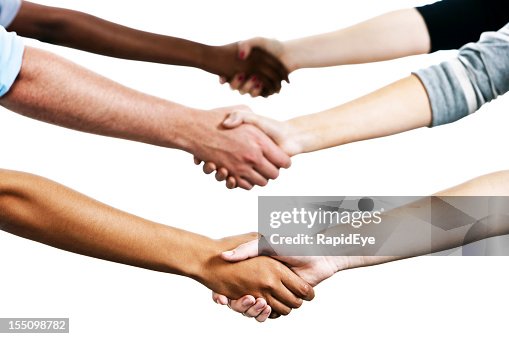 Six mixed people shake hands against white Six mixed people shake hands against white