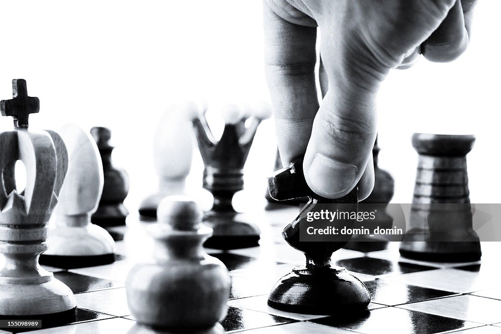 Checkmate Strategy, Chess player or businessman making his checkmate move
