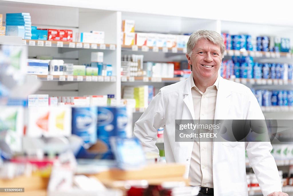 Male pharmacist at drugstore