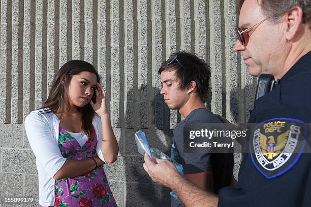 arrested - marijuana arrest stock pictures, royalty-free photos & images