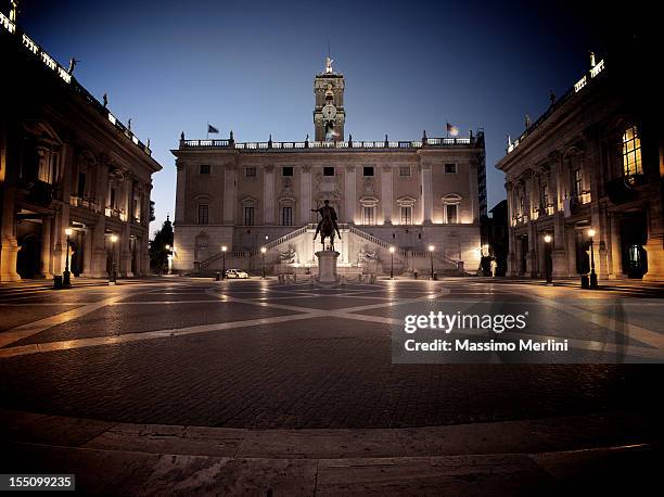 michelangelo's piazza del campidoglio in rome - town square night stock pictures, royalty-free photos & images