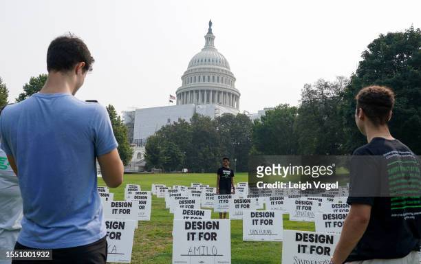 The youth-led coalition, Design It For Us, placed hundreds of signs on the west lawn of the U.S. Capitol, calling on lawmakers to pass legislation to...