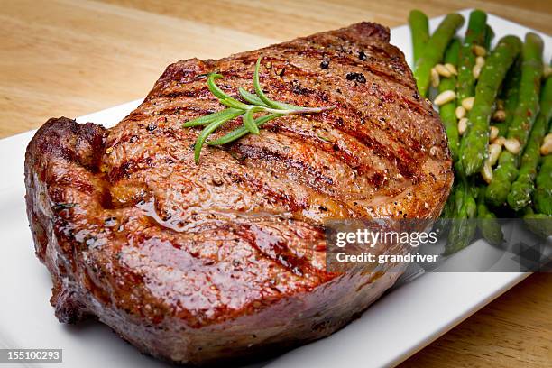 big rib eye beef steak - juicy stock pictures, royalty-free photos & images