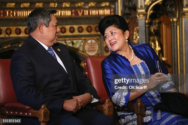 Susilo Bambang Yudhoyono, the President of the Republic of Indonesia, sits with his wife Ani Bambang Yudhoyono after delivering a speech to...