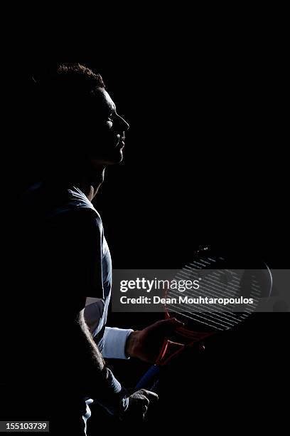 Andy Murray of Great Britain walks on the court to play his match against Jerzy Janowicz of Poland during day 4 of the BNP Paribas Masters at Palais...