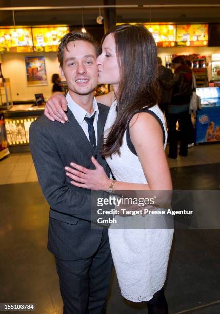 Actor Tom Schilling and his girlfriend Annie Mosebach attend the 'Oh Boy' Premiere at Kulturbrauerei on October 31, 2012 in Berlin, Germany.