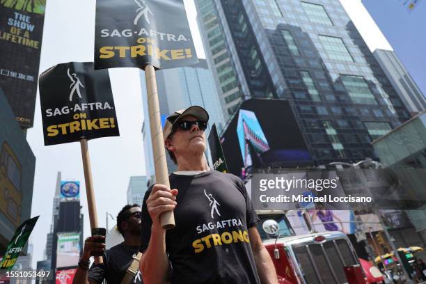 Kevin Bacon and SAG-AFTRA members and supporters protest as the SAG-AFTRA Actors Union Strike continues on Day 5 in front of Paramount Studios at...