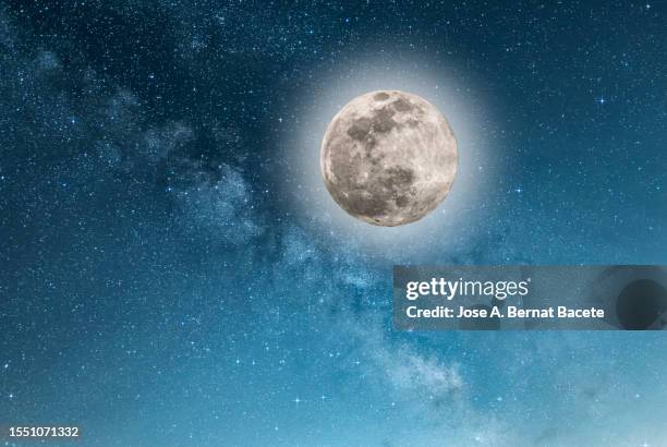 night deep space with the milky way and full moon. - the light of the moon film stock pictures, royalty-free photos & images