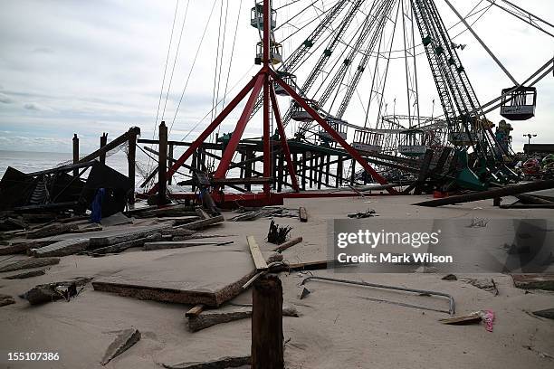 Amusement rides lie mangled after the Fun Town pier they sat on was destroyed by Superstorm Sandy on November 1, 2012 in Seaside Heights, New Jersey....